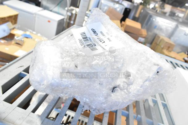 Bubble-wrapped item with barcode label; part of a lot with Estella Caffe heating block, Avantco water pump, and HP 951 ink.