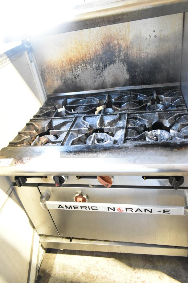 2016 American Range AR-6 commercial gas range with 6 burners, oven, overshelf, and backsplash; shows use signs.