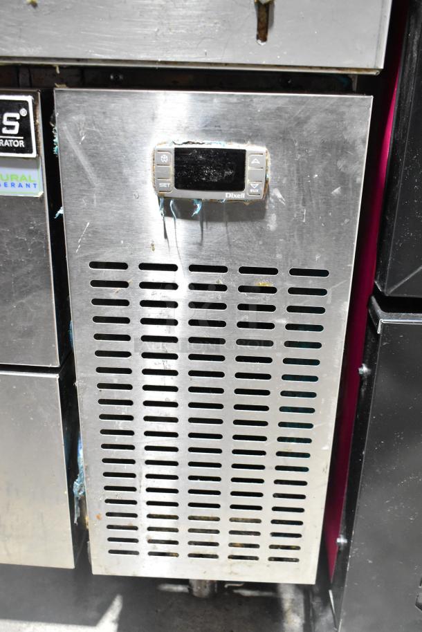 Dukers DCB48 commercial 2-drawer chef base with vents and control panel. Features 115 volts, 1 phase, on casters.