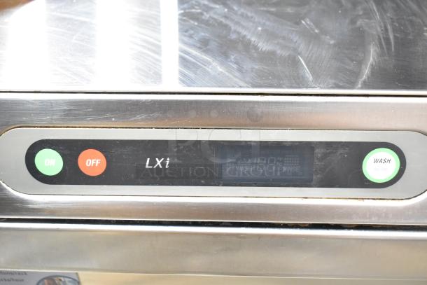 Hobart LXIH undercounter dishwasher, model LXIH, in stainless steel with control panel displaying settings.
