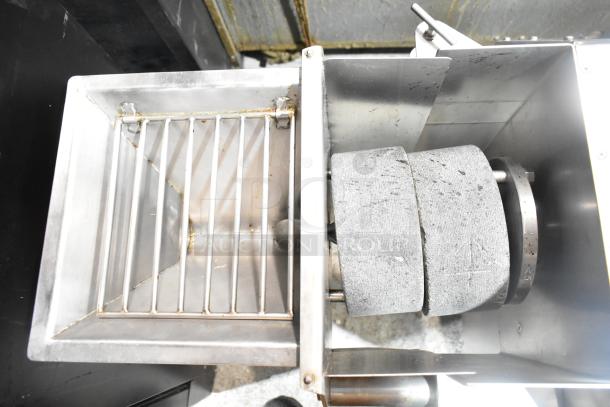 C65-8 commercial unit, 230 volts, 3 phase; stainless steel with dual stone rollers, excellent condition.