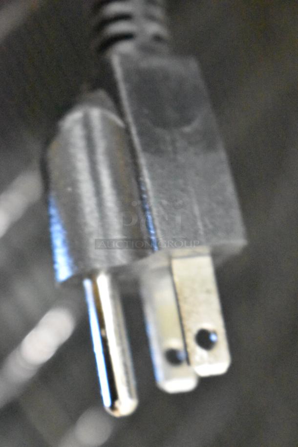 Close-up of Atosa CTD-3ST Commercial Cooler Merchandiser plug, showing a 115-volt, 1-phase power connection.