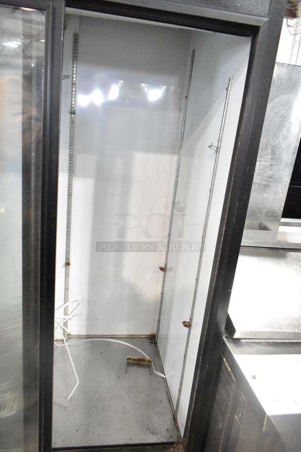 Beverage Air MT38 Commercial 2 Door Cooler, empty interior, visible shelving tracks, 115 volts, used condition.