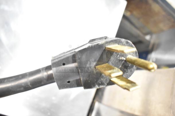 Close-up of the plug for a Hobart LX30H commercial undercounter dishwasher, 120/208 volts, 1 phase.