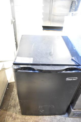 Magic Chef HMAR265BE Mini Cooler, black, 115V, 1 Phase, some surface wear, visible Magic Chef logo.