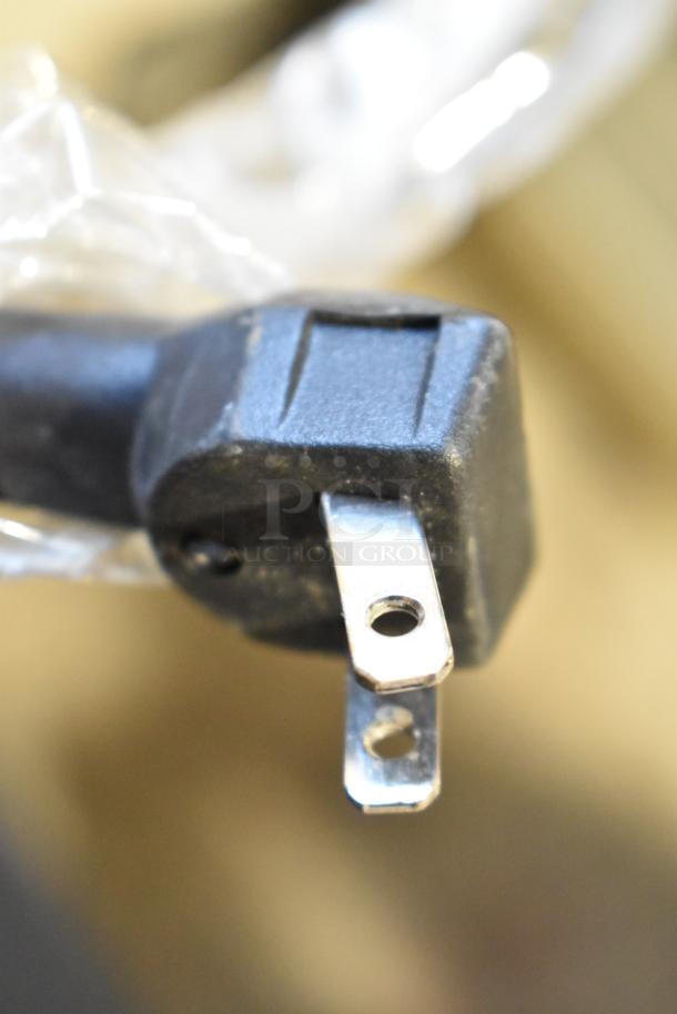 Close-up of a power plug for Magic Chef HMAR265BE Mini Cooler, 115 Volts, 1 Phase.