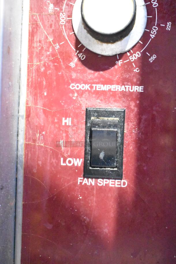 Southbend gas convection oven control panel showing temperature dial and fan speed switch.