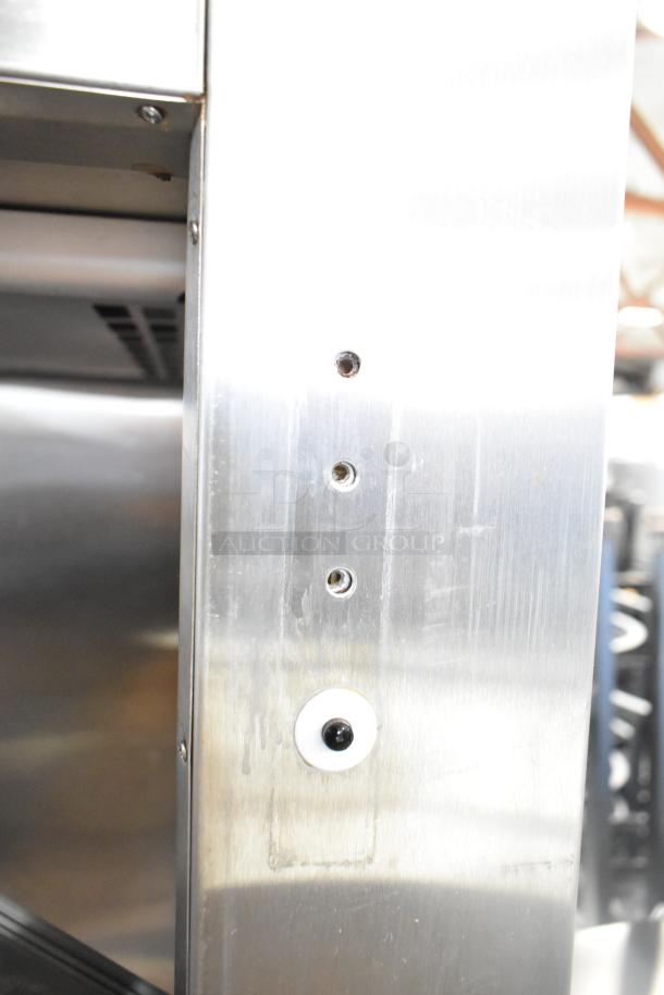 Traulsen RLT232WUT-FHS freezer detail showing missing door hinges and attachment points, 115V, 1 phase.