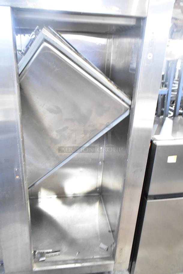 Traulsen RLT232WUT-FHS commercial freezer; 2 doors need reattachment, missing hinges; 115V, 1 phase.