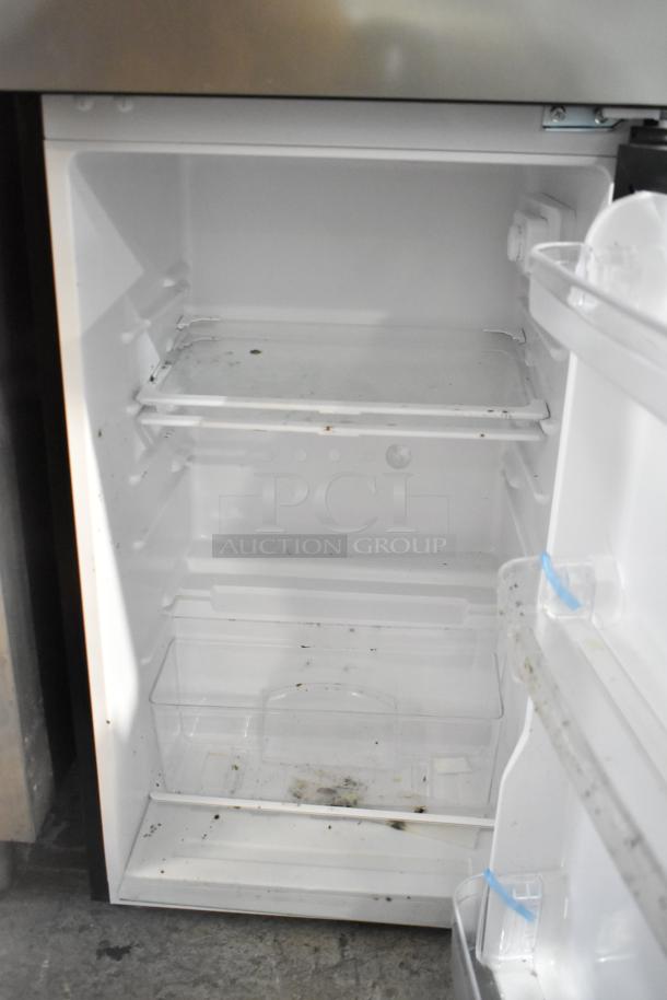 Vissani HVDR45PS cooler with freezer, empty interior, used condition, 115 volts, 1 phase.