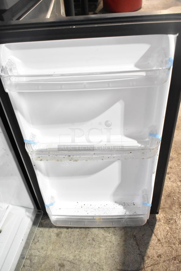 Vissani HVDR45PS Cooler with freezer section, 115V, 1 phase. Interior door with three compartments, used condition with visible dirt.