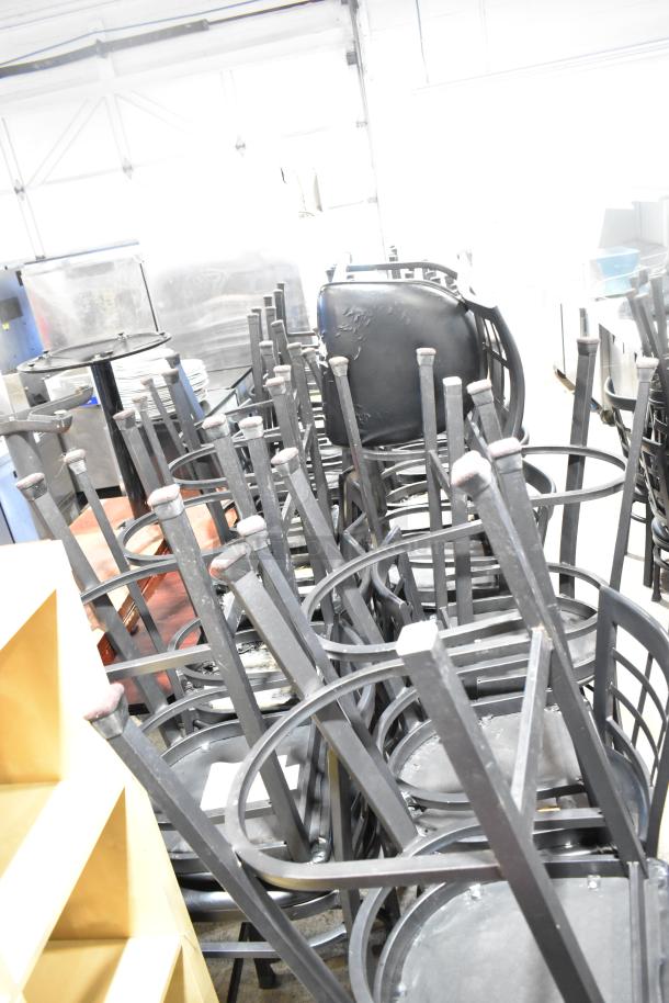 37 black window back bar height chairs with black seat cushions, stacked condition, sell 37 times per bid.