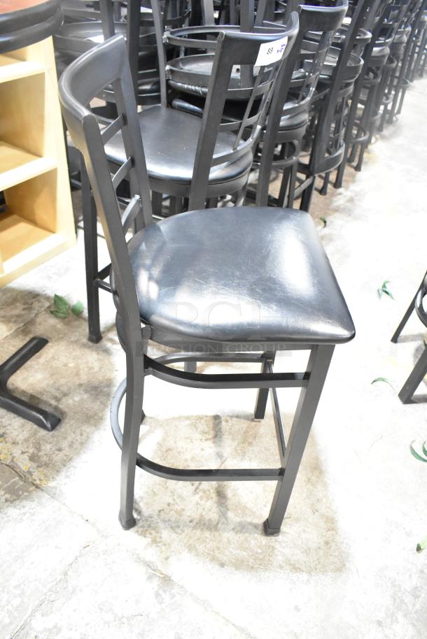 Black window back bar height chair with black seat cushion, sturdy metal frame, auction lot of 37, good condition.