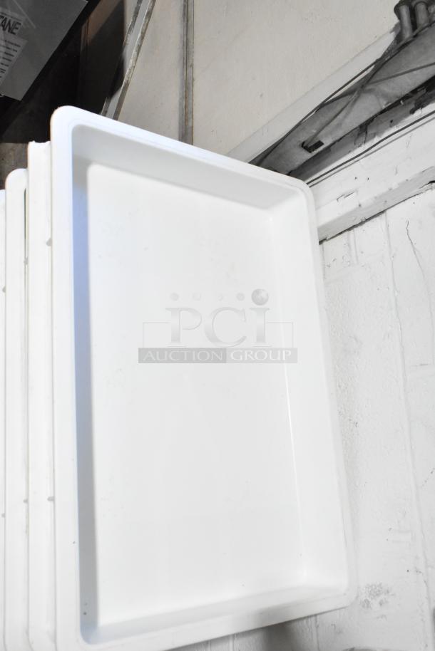 Set of 10 white ply dough bins and 3 racks with white finish, in good condition. Ideal for bakery use.