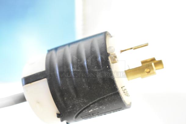 Close-up of an electrical plug labeled "L520P" related to the 2021 Solwave 180MW1000SS Commercial Microwave Oven.