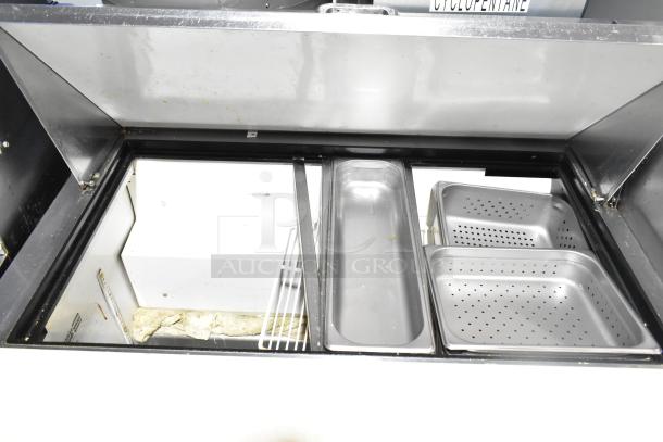 True TSSU-72-30M-B-ST salad prep table bain marie with mega top, showing stainless steel pans and commercial casters. 115V.