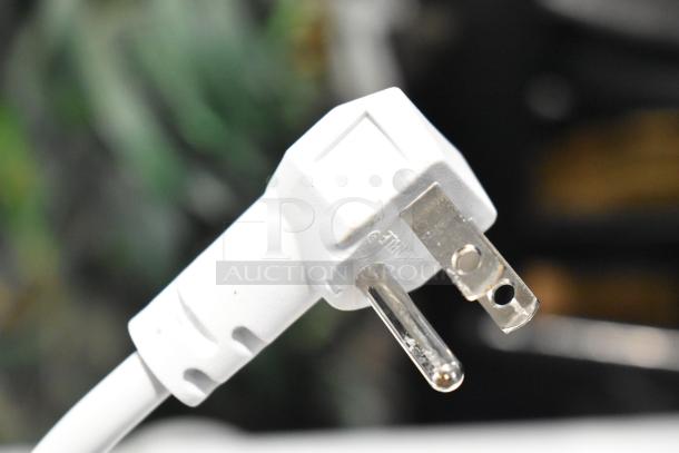 Close-up of a power plug for the Vissani HMCF7W5 Chest Freezer. 115 Volts, 1 Phase, showing three prongs.