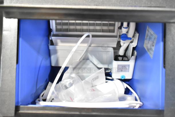 WQ30FT Commercial Undercounter Ice Machine, 110V, 1 Phase, interior view showing components and caution labels.