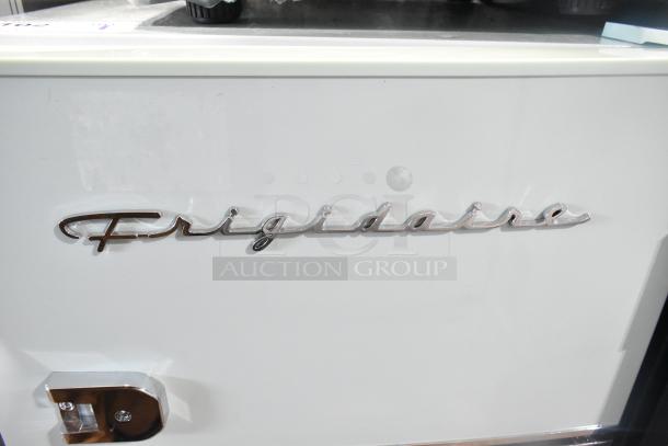 Brand new Frigidaire EFR840-MINT-6COM mini cooler with freezer. Scratch and dent item. 115 Volts, 1 Phase. Frigidaire logo visible.