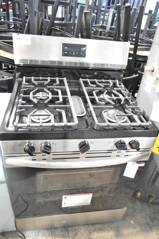 Frigidaire FCRG3052BSF, natural gas-powered 4-burner range with oven, stainless steel, control panel shown, new condition.