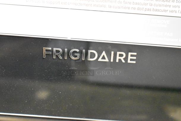 Frigidaire FCRG3052BSF 4 burner natural gas range with oven, clean black finish, visible brand logo.