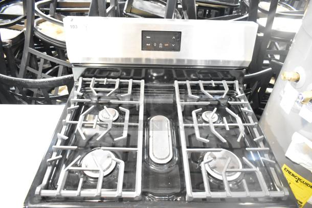 Frigidaire FCRG3052BSF 4-burner natural gas range with oven, stainless steel finish, digital control panel.