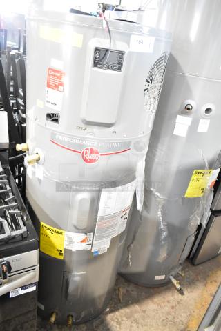 Rheem Performance Platinum hot water heater, 208/240 volts, with digital control panel and energy guide labels.