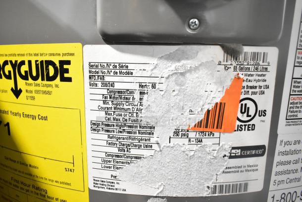 Rheem hot water heater label, 208/240 volts, model XE65T10HS45U1. EnergyGuide label shows estimated cost. UL listed.