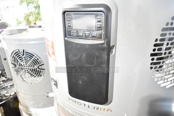 Rheem COC1I8V hot water heater, 208/240V, digital control panel, good condition, ProTerra branding visible.