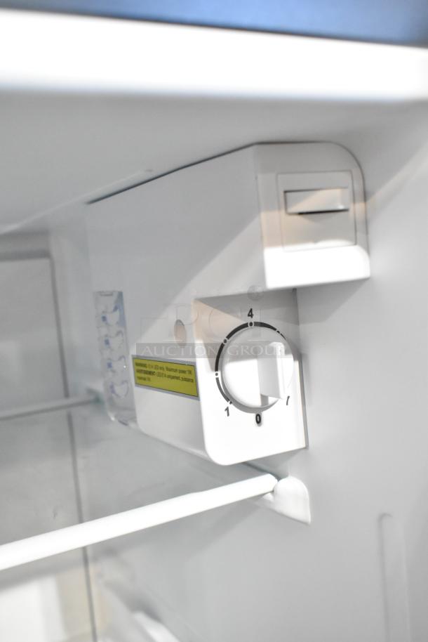 Vissani HVAR32SE Mini Cooler interior view showing control dial, model plate, and shelving. 115V, 1 phase. Excellent condition.