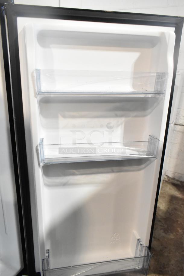 Vissani HVAR32SE mini cooler interior with three clear shelves; 115 volts, 1 phase; clean condition.