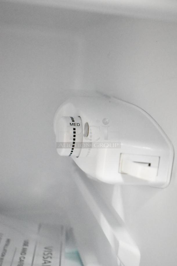 Vissani MDCM31SS5 mini cooler interior showing temperature control dial set to "MED." Brand new with scratch and dent.