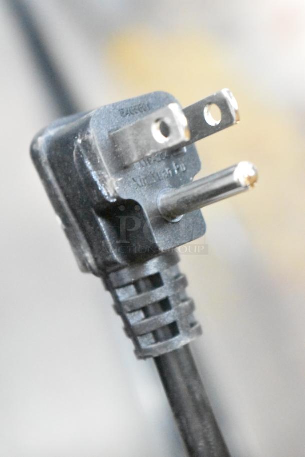 Black power plug for Vissani MDCM31SS5 mini cooler, 115 volts, 1 phase. Close-up of prongs and cord detail.