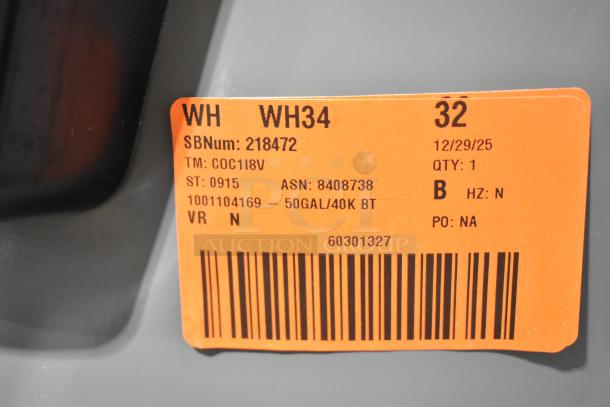 Rheem COC1I8V hot water heater, 208/240V, 50GAL/40K BTU. Orange label showing model, serial number, and specifications.