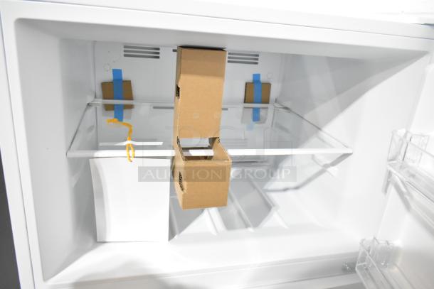 Brand new Vissani MDTF14WH5 reach-in cooler with freezer, 115V, 1 Phase; minor scratches visible. Interior shelving intact.