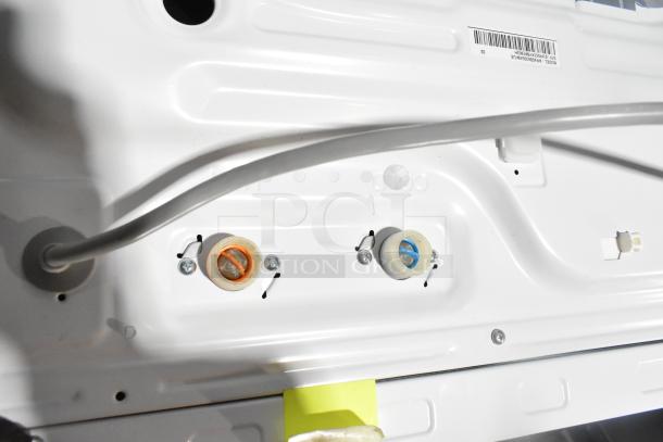 Brand new Samsung WF45B6300AW/US front load washer, scratch and dent condition. Cold water inlet visible.