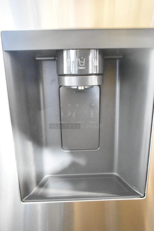 LG LRFXC2606S/00 French door refrigerator with drawer freezer and ice/water dispenser. Brand new, scratch and dent model.