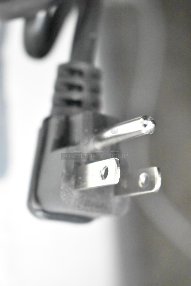 Close-up of a three-prong power plug from a Vissani MDBF18SS Cooler. 115 Volts, 1 Phase. Scratch and dent condition.