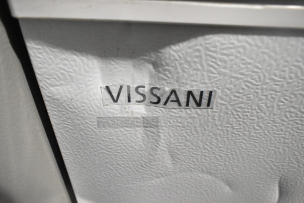 Brand new Vissani HMCF7W5 chest freezer, 7.0 cu. ft., manual defrost, 115V. Visible label with brand logo, minor dents.