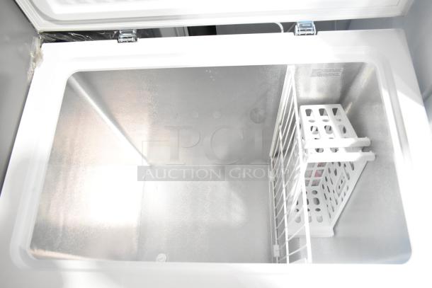 Brand new Vissani HMCF7W5 7.0 cu. ft. chest freezer, manual defrost, 115V, with interior basket. Scratch and dent condition.