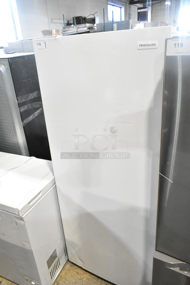 Brand new Frigidaire FFFU13F2VW upright freezer, 115 volts, slight surface scratches, white finish.