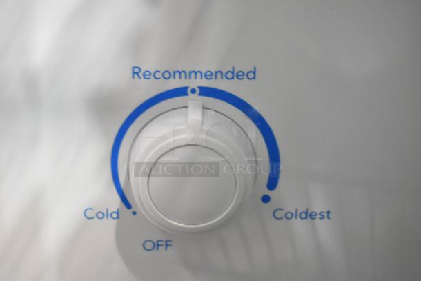 Frigidaire FFFU13F2VW Freezer temperature dial showing "Off," "Cold," "Coldest," and recommended setting.