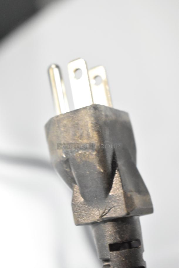 Frigidaire FFFU13F2VW upright freezer power plug, showing new condition, minor scratches, 115V technical specifications.