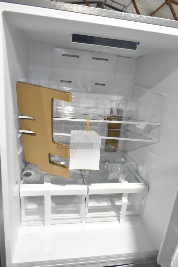 Brand new Vissani MDBF18SS reach-in cooler with freezer drawer. Interior shelves, 115 volts, 1 phase. Scratch and dent condition.