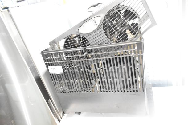 AirCare Fan with dual blades, black grille, and control panel, in good condition. Label "121" visible on side.