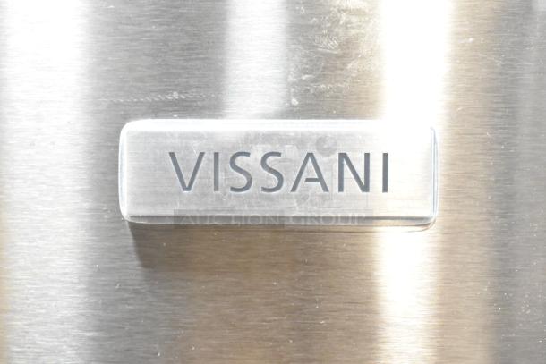 Vissani MDBF18SS stainless steel reach-in cooler, new with minor scratches. Features freezer drawer, 115V, 1-phase. Vissani label visible.