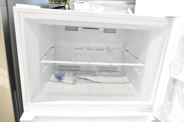 Brand new 2025 Vissani MDTF14WH5 reach-in cooler with freezer, 115 volts, 1 phase. Visible interior shelf and packaging. Scratch and dent condition.