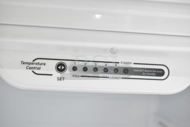 Temperature control panel of Vissani MDTF18WHR Reach In Cooler with Freezer, showing settings from cold to coldest with standby feature.