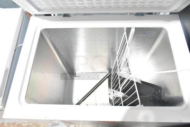 Brand new 2025 Vissani HMCF7W5 chest freezer, 7.0 cu. ft., manual defrost, 115V, 1 phase, open lid view, minimal scratches.