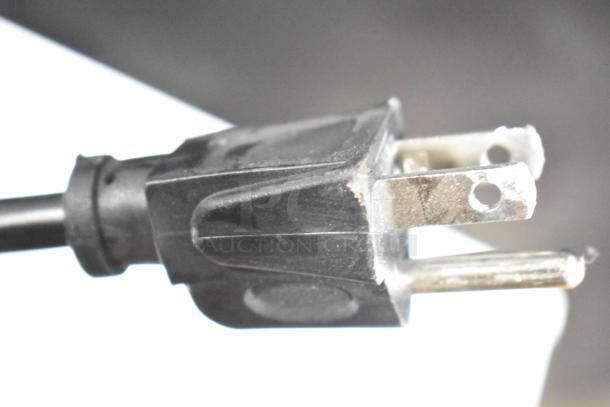 Close-up view of the power plug for a Vissani VSF11US2A16 cooler/freezer. 115 volts, 1 phase.